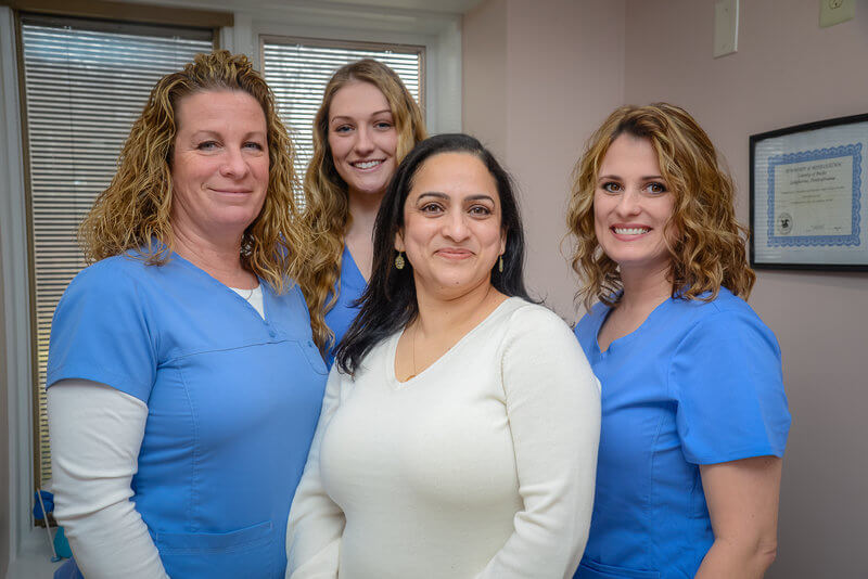 Dr. Arti Kaul and the Lofts Dental Care team